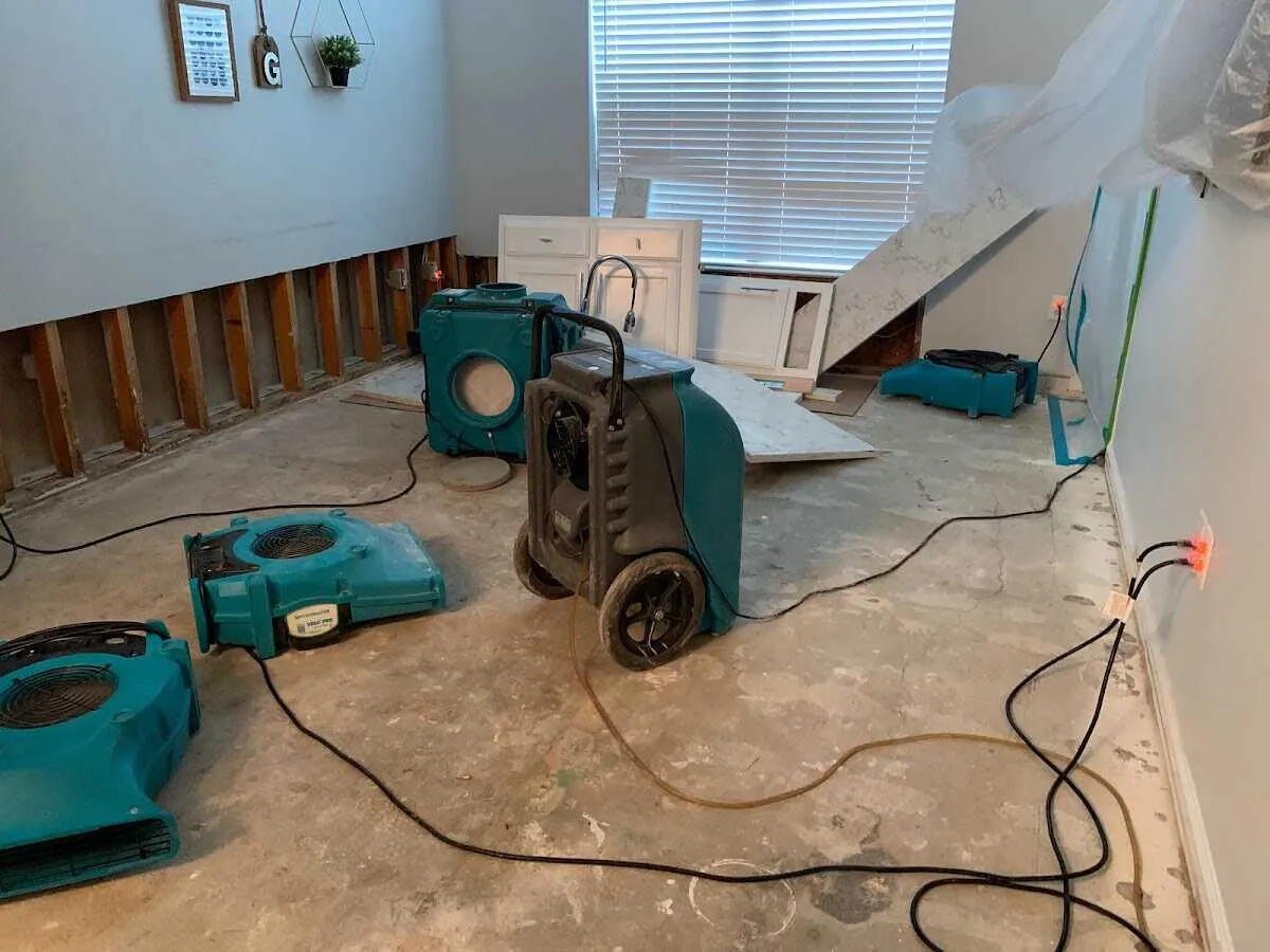 Dehumidifier in flood-cut room for Water Damage Restoration in Moss Point